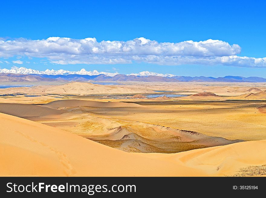 Himalayas. View from the Tibetan plateau to the valley of the Brahmaputra River. There are sand dunes