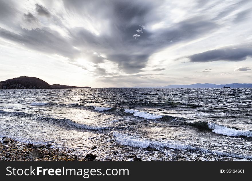 Sea landscape in the light of the evening sun