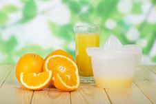 Orange Slices, Glass And Juice Extractor Stock Photo Orange Slices, Glass And Juice Extractor Stock Photo