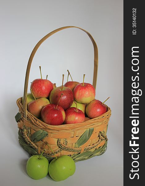 Basket of crabapples isolated on a white background.