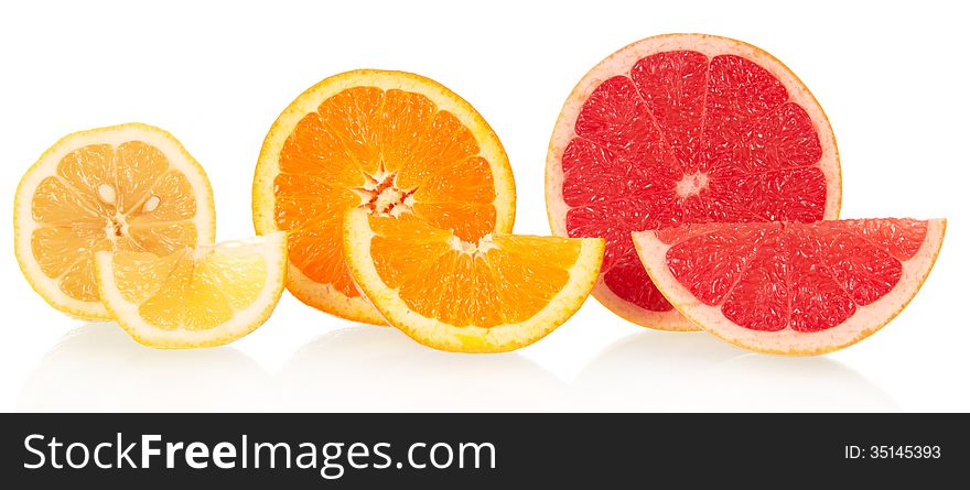 Lemon, orange and grapefruit in a cross-section isolated on a white background