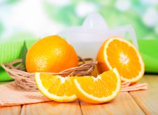 Segments Of Orange And A Juice Extractor Stock Photography Segments Of Orange And A Juice Extractor Stock Photography