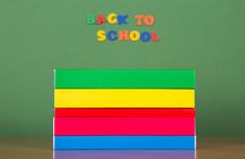 Stack Of Books And Set Plastic Letters Royalty Free Stock Photo