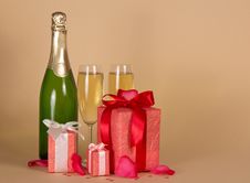 Bottle And Wine Glasses With Champagne, Three Gift Royalty Free Stock Image Bottle And Wine Glasses With Champagne, Three Gift Royalty Free Stock Image