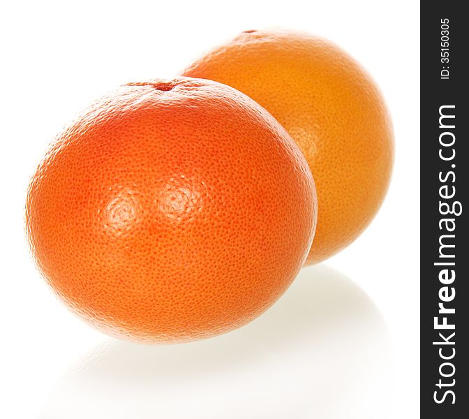 Two grapefruits isolated on the white