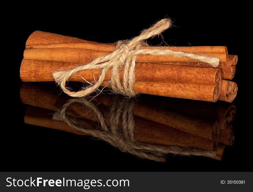 Cinnamon sticks, shot close-up on the table.