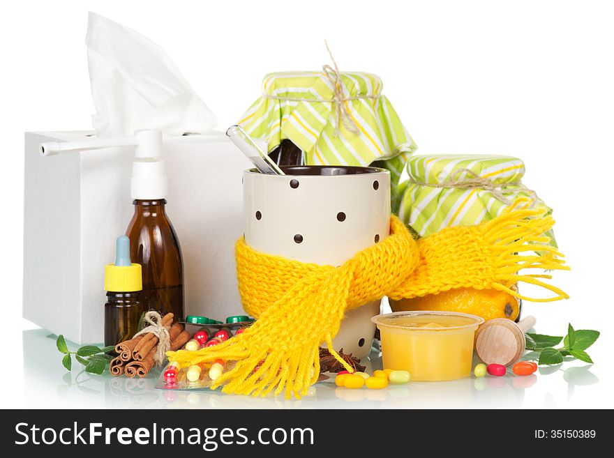 Different cold medicines on a white background