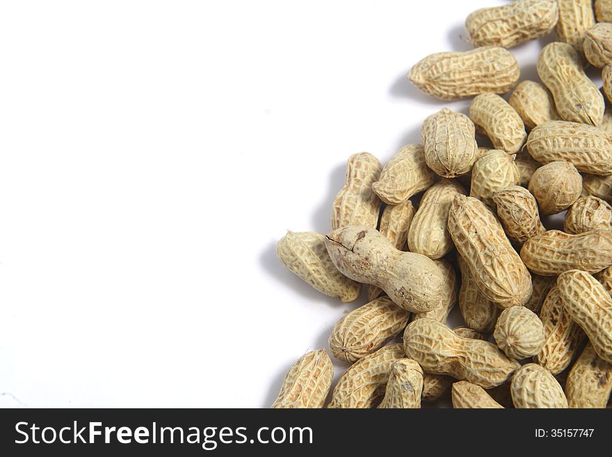 Spill Peanuts on White background