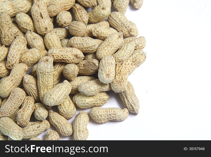 Spill Peanuts on White background