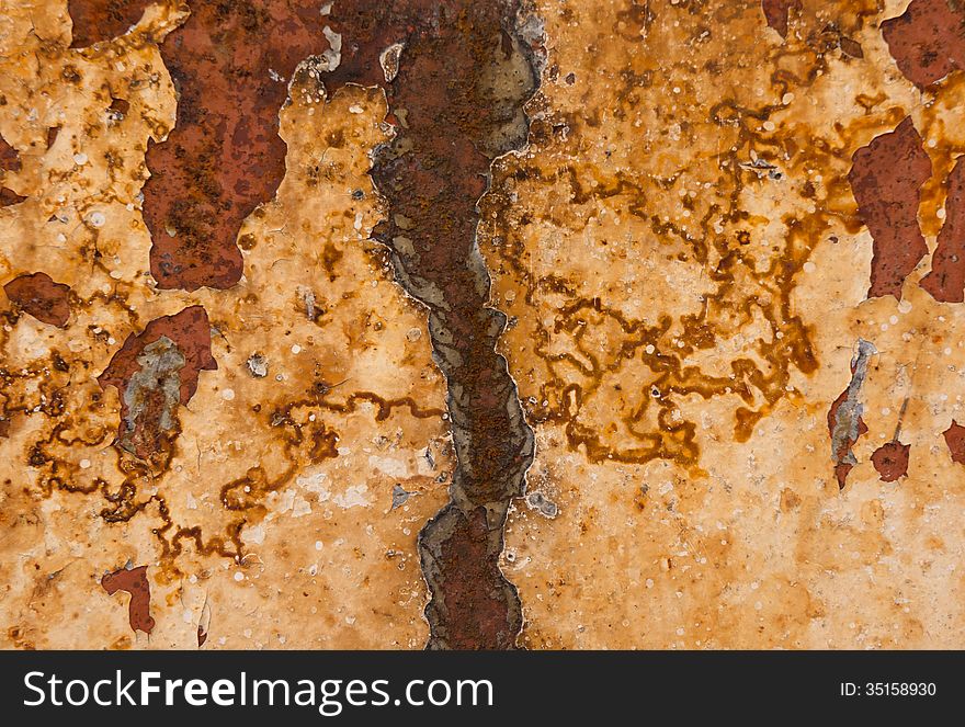 Seamless background of a rusty metal sheet.