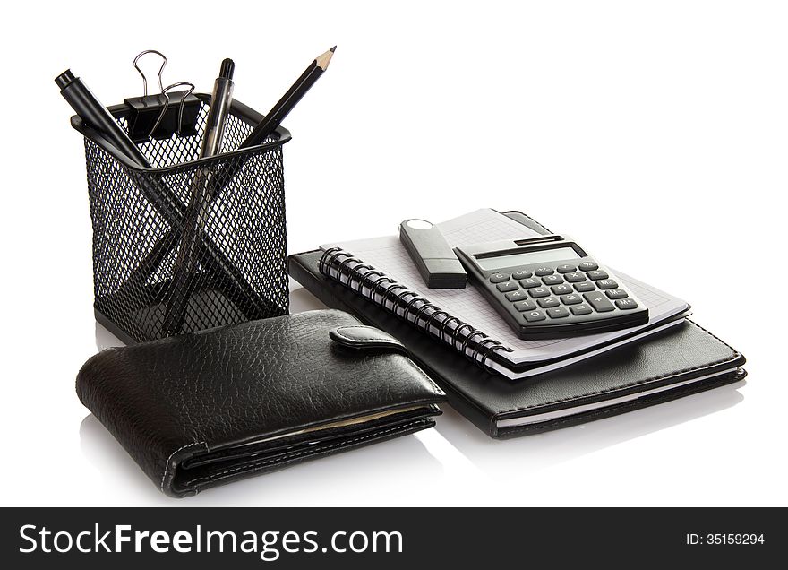 A set of office accessories, man's purse and flash card isolated on white. A set of office accessories, man's purse and flash card isolated on white