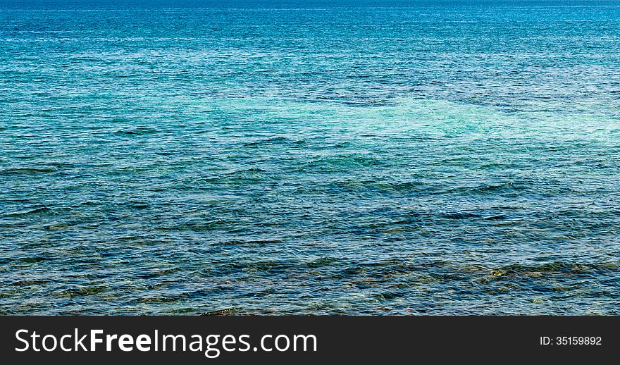 Sea Water surface with deep blue colors.