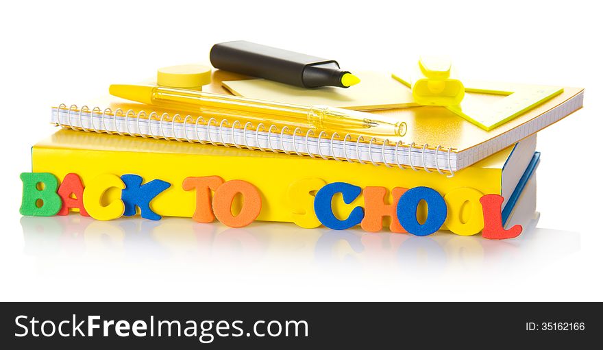 Back to school. The book, exercise book and the felt pen, isolated on white