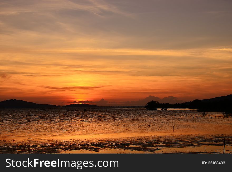 A sunset scene in Songkhla, Thailand.