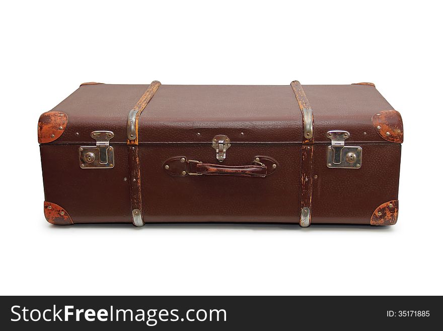 Old big suitcase isolated on a white background