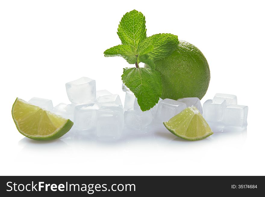 Ice cubes, lime, mint and the slices of a lime isolated on white. Ice cubes, lime, mint and the slices of a lime isolated on white