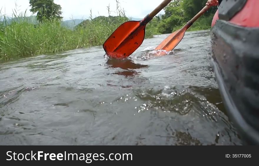 Canoe rowing in the river