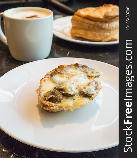 Breakfast with Bruschetta Mushroom , latte coffee, mushroom pie. Breakfast with Bruschetta Mushroom , latte coffee, mushroom pie.