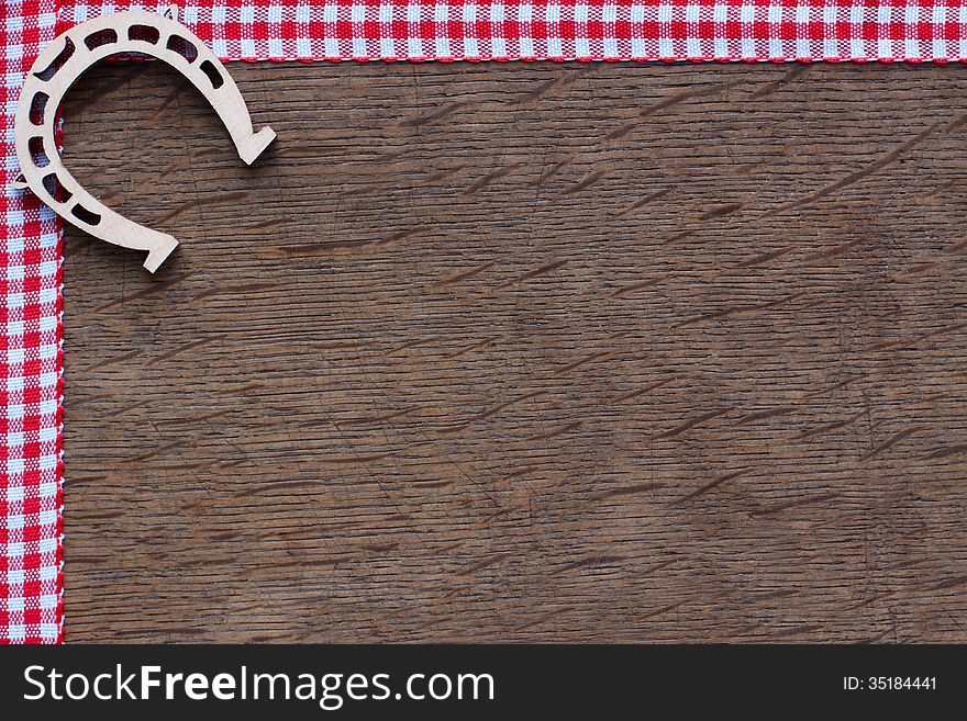 Horseshoe on a  wooden  background