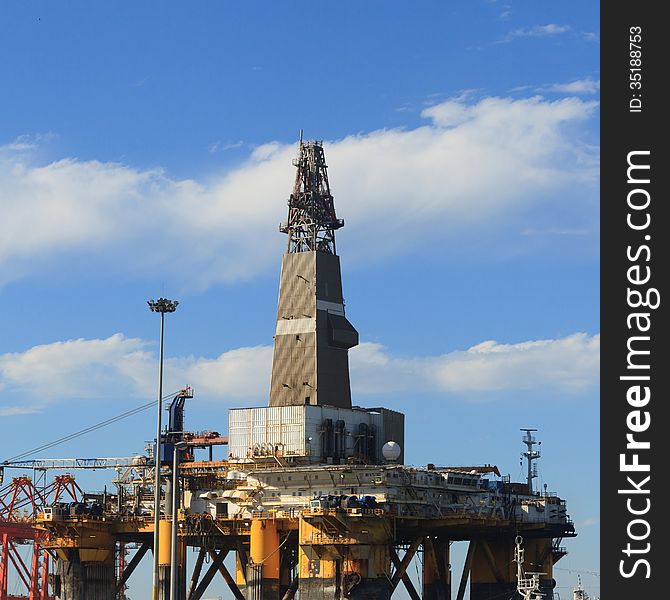 Semi Submersible Drilling Rig in the shipyard on sunny day