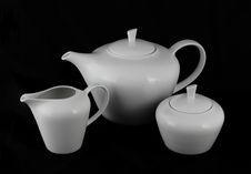 Set Porcelain Pitchers And Sugar Bowl Stock Photography