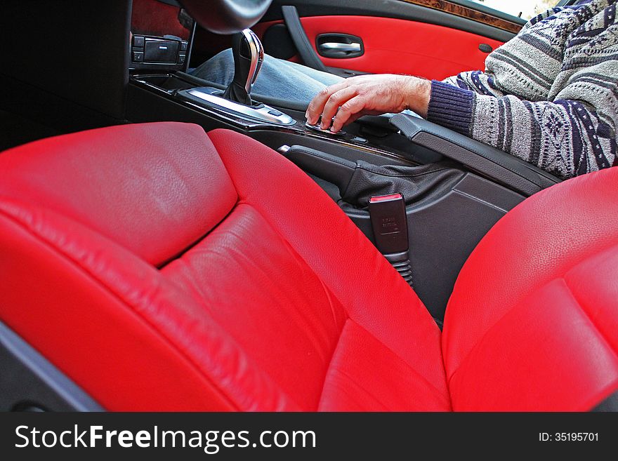 Luxury red leather interior and fast car. Luxury red leather interior and fast car