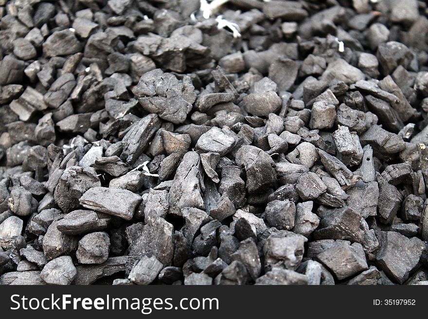 Close-up of Black Coal with distance blur. Close-up of Black Coal with distance blur.