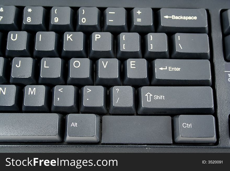 The word Love spelled on a keyboard. The word Love spelled on a keyboard