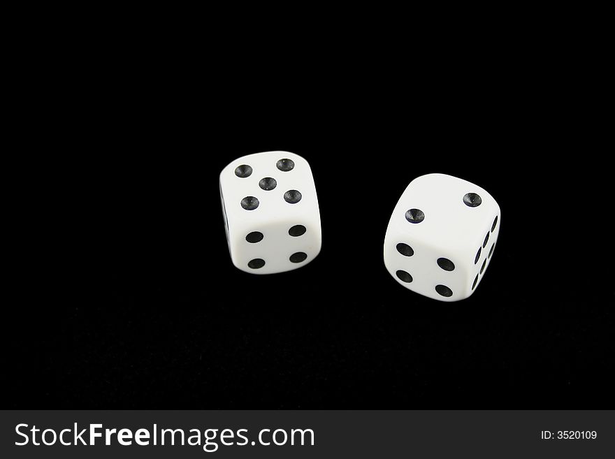 Seven and boxcars dice isolated on black background