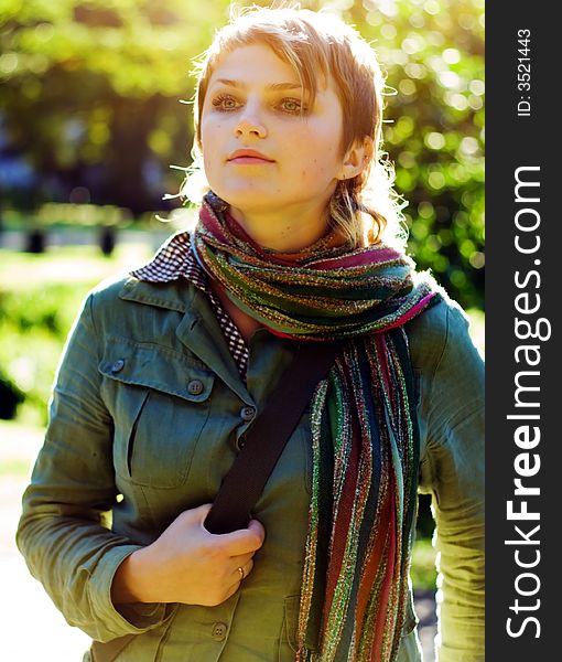 Cute girl in Scarf. Close up shot.