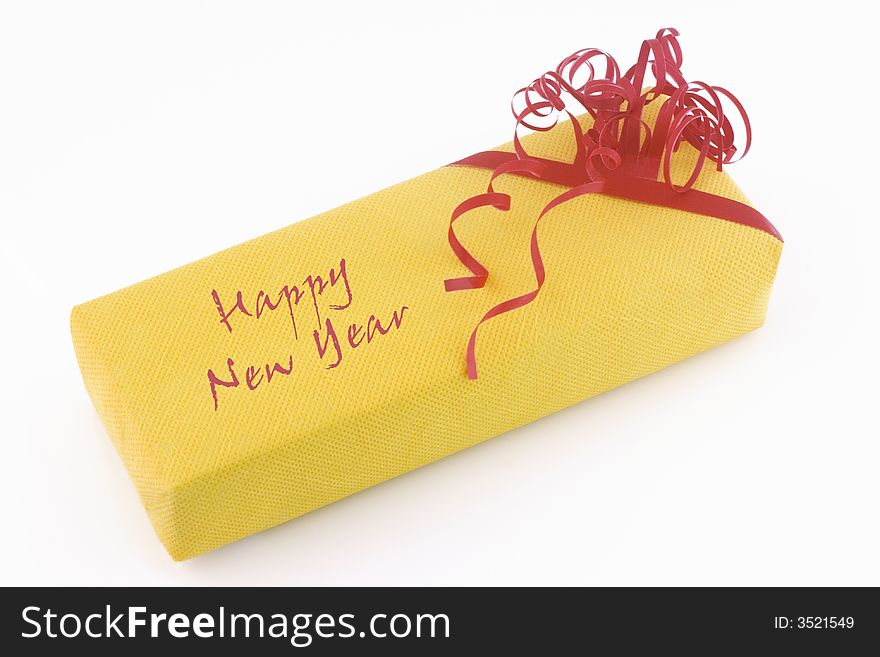 Yellow gift box over white background