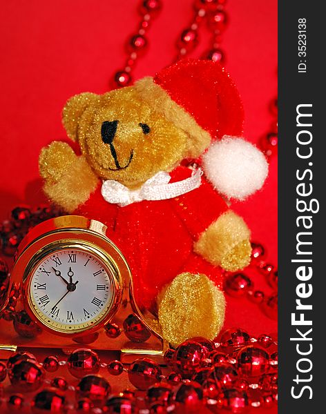 Clock, toy - bear and christmas decorations. Clock, toy - bear and christmas decorations.