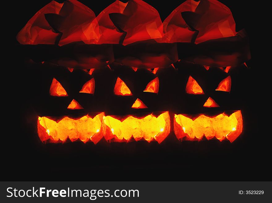 Pumpkins with black background at halloween dag