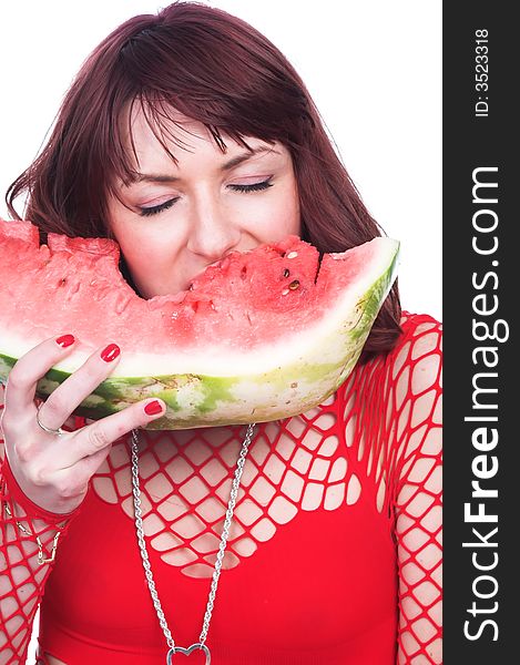 The girl eats a water-melon
