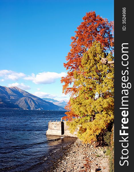 Lake landscape in fall season, Como Lake, Italy. Lake landscape in fall season, Como Lake, Italy