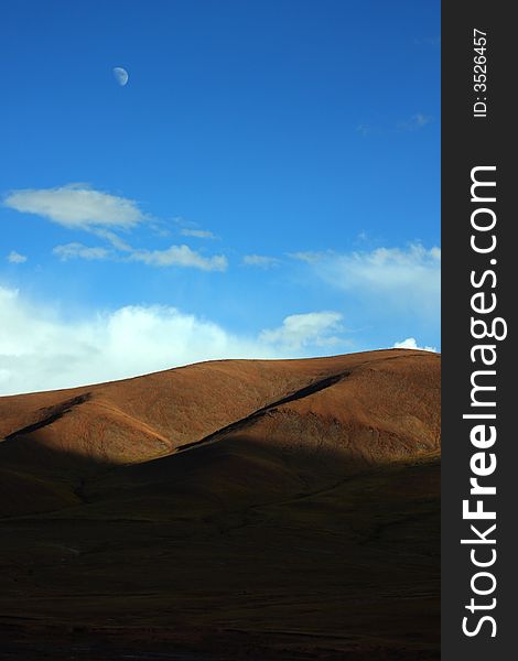 Moon hang in the aire on prairie on the north of tibet. Moon hang in the aire on prairie on the north of tibet.