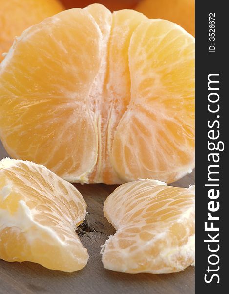 Slices of delicious and fresh tangerine. Slices of delicious and fresh tangerine