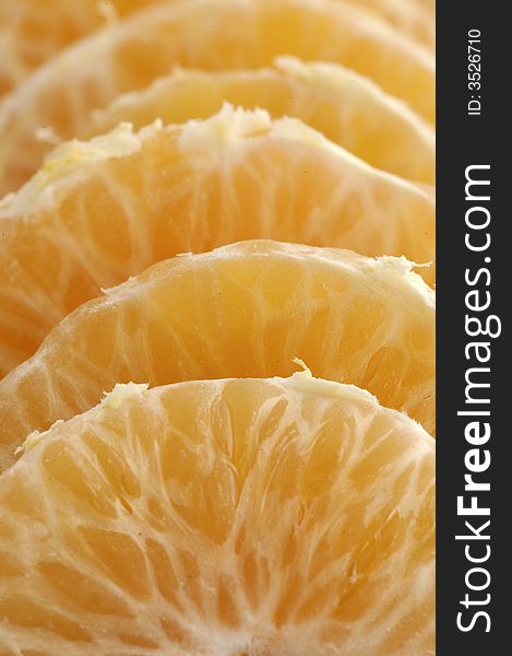 Slices of delicious and fresh tangerine. Slices of delicious and fresh tangerine