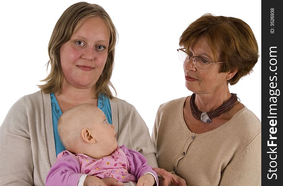 Three generation picture with a baby her mother and her great-grandma. Three generation picture with a baby her mother and her great-grandma