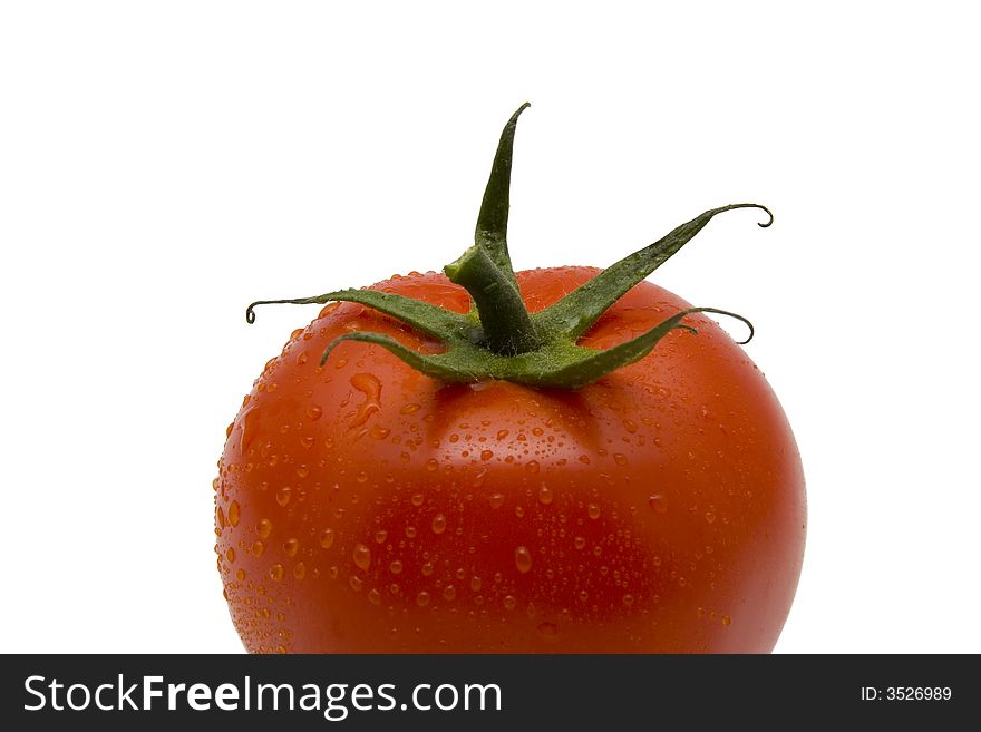 Tomato close up isolated on white