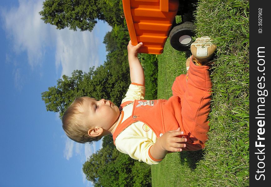 One little boy play with car. One little boy play with car