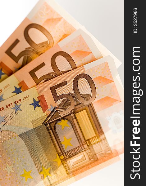 Three European fifty euro banknotes. Three European fifty euro banknotes