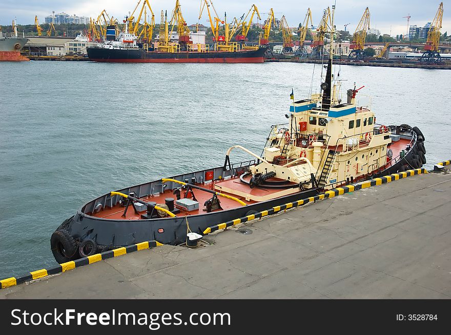 Moored tugboat at a port