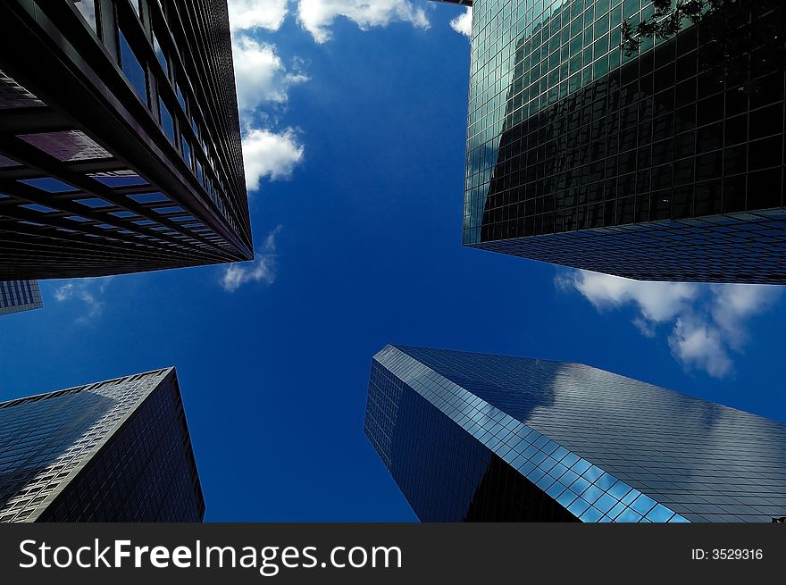 Lower manhattan buildings with blue sky on the background