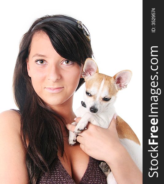 Girl with chihuahua isolated on white in a studio
