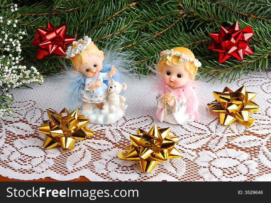 Christmas angels decorations on crumb-cloth