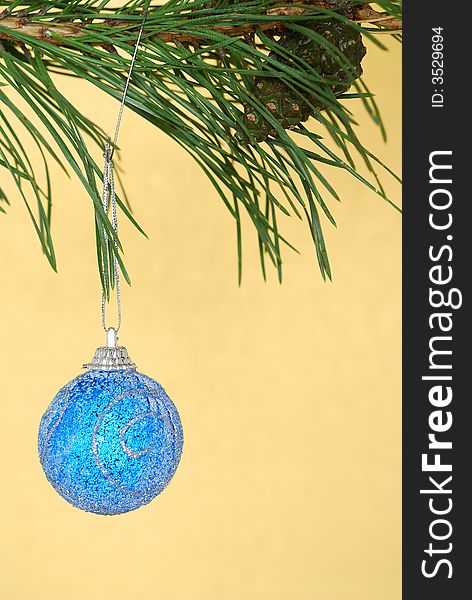 Christmas decorations opposite golden background