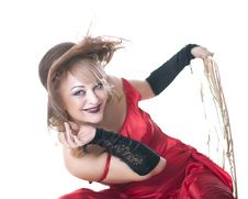 Woman In A Red Dress Posing On A Chair Royalty Free Stock Photos Woman In A Red Dress Posing On A Chair Royalty Free Stock Photos