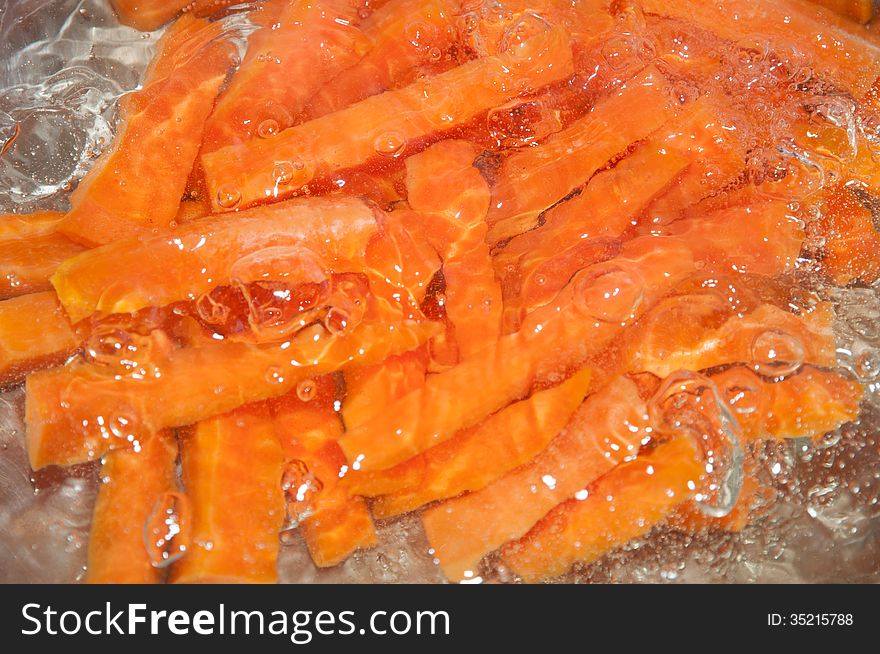 Boiling carrot for food background