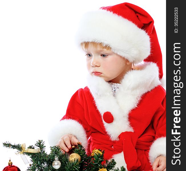 Little girl dressed in Santa Claus